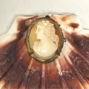 Natural Shell Cameo with Trombone Clasp and a Hinged Bail